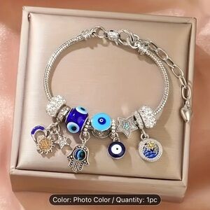 Silver Charm Bracelet with Blue Accents